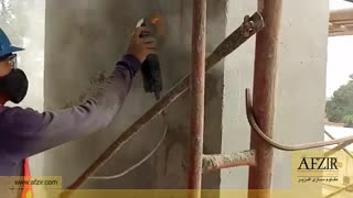 اجرای سیستم  CFRP  کربن بر روی ستون کتابی بتنی